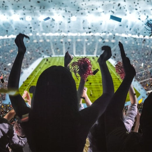What are the advantages of using LED flood lights at sports venues?